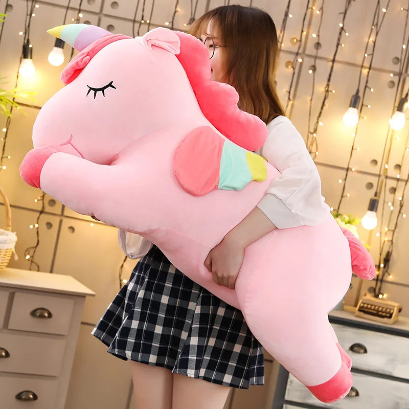 Oversized Pink Sleeping Unicorn Plush with Rainbow Accents