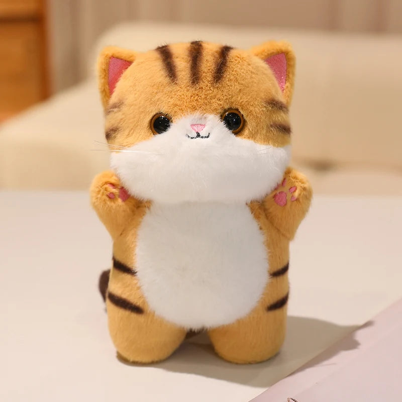 Adorable Plush Cat in Striped Cupcake Bed - Image 7
