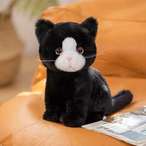 Black and White Plush Cat with Big Golden Eyes