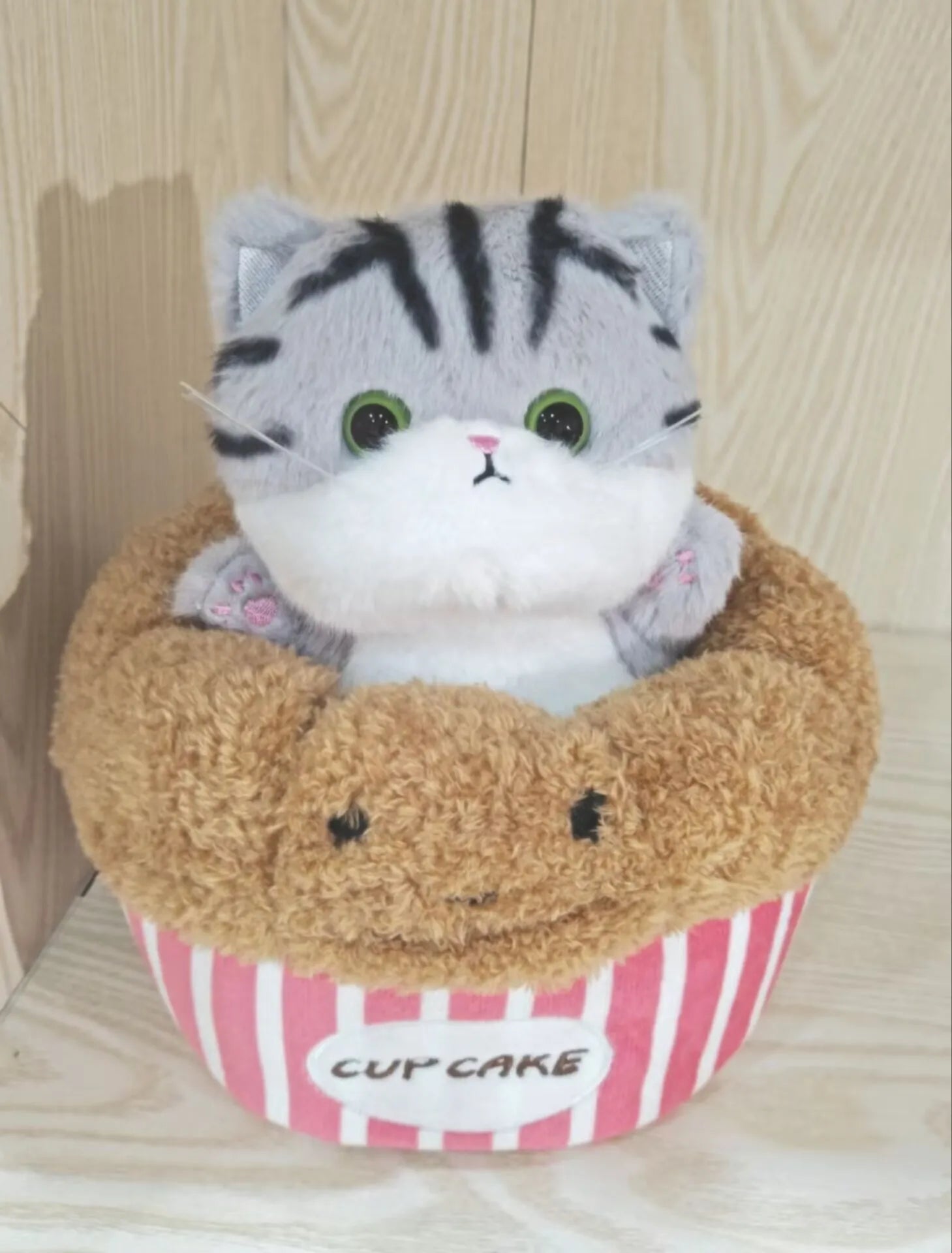 Adorable Plush Cat in Striped Cupcake Bed - Image 17