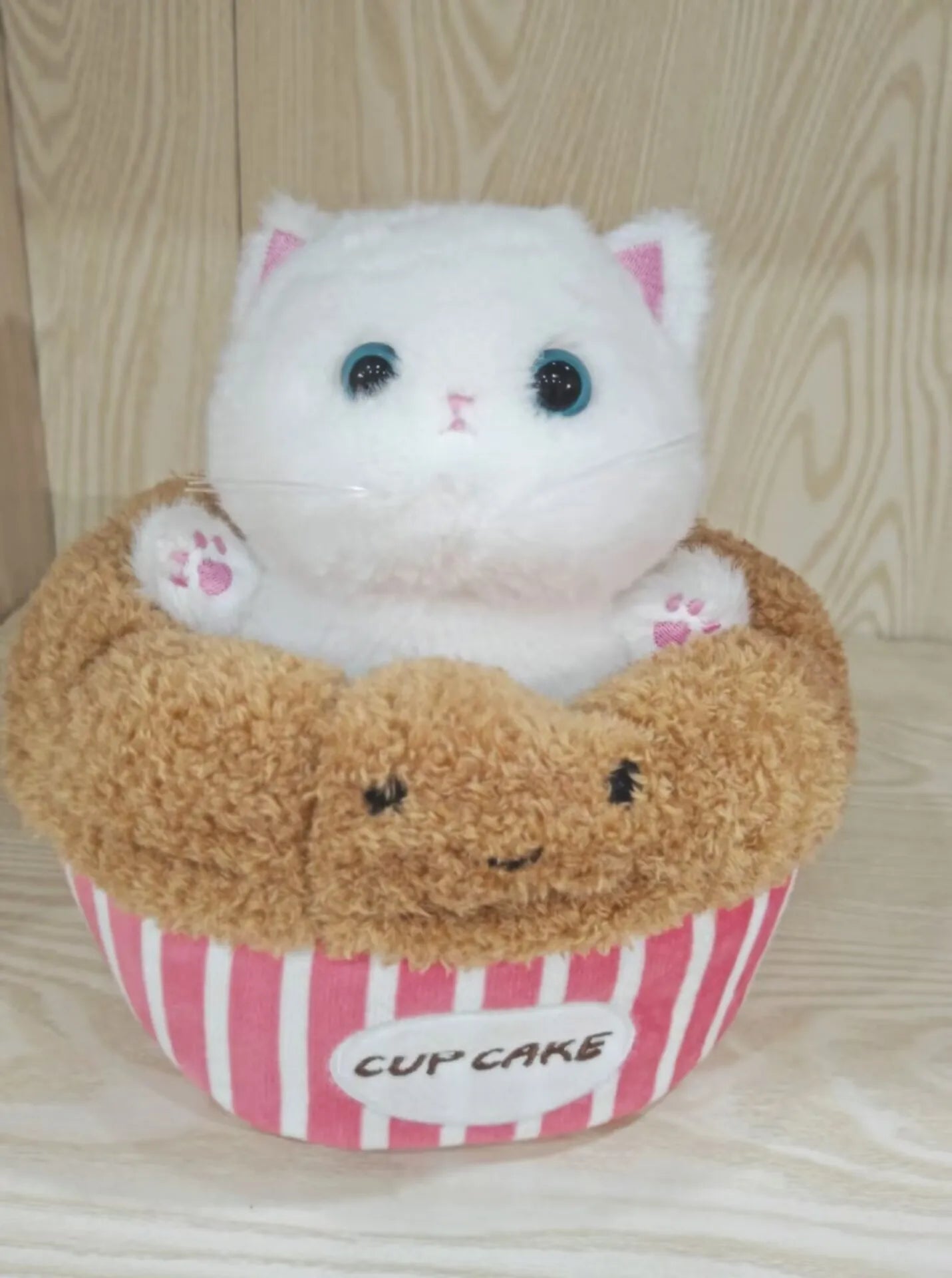Adorable Plush Cat in Striped Cupcake Bed - Image 18