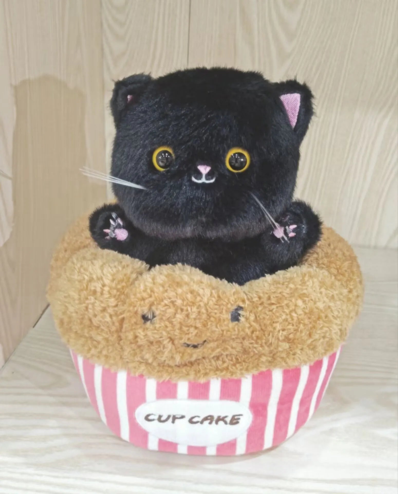 Adorable Plush Cat in Striped Cupcake Bed - Image 13
