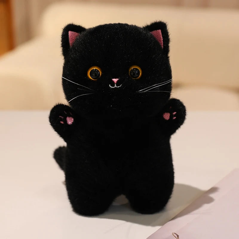 Adorable Plush Cat in Striped Cupcake Bed - Image 11