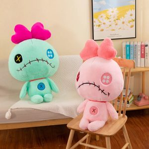 Stitched Alien Plush Toy with Button Eyes and Bow