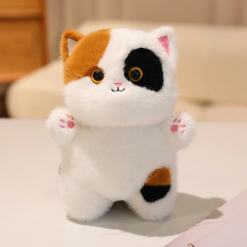 Adorable Plush Cat in Striped Cupcake Bed - Image 5