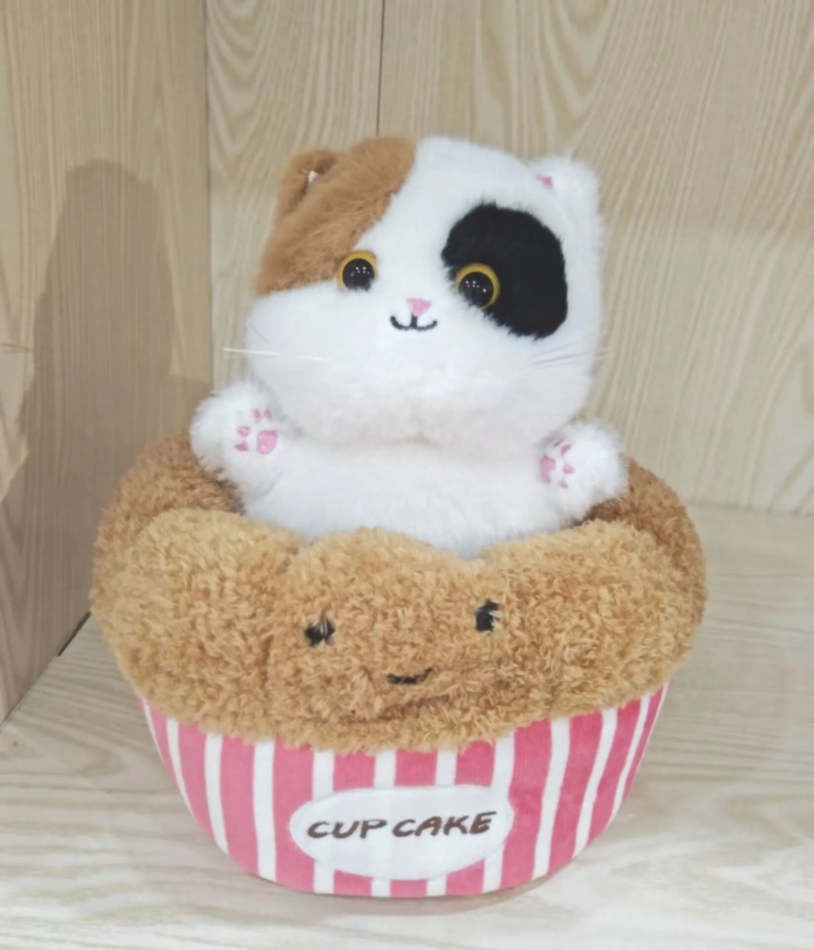 Adorable Plush Cat in Striped Cupcake Bed - Image 15