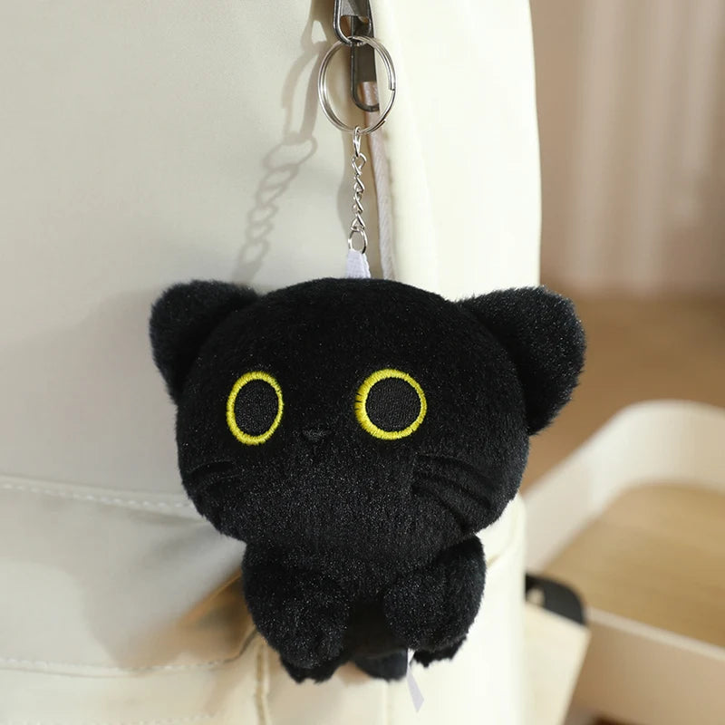 Adorable Black Cat Plush with Yellow Eyes - Image 5