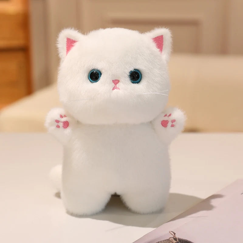 Adorable Plush Cat in Striped Cupcake Bed - Image 14