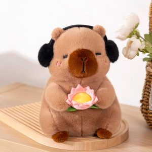 Peaceful Capybara Plush Toy with Headphones and Lotus