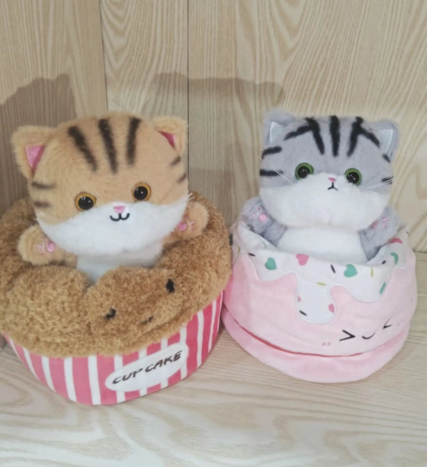 Adorable Plush Cat in Striped Cupcake Bed - Image 2