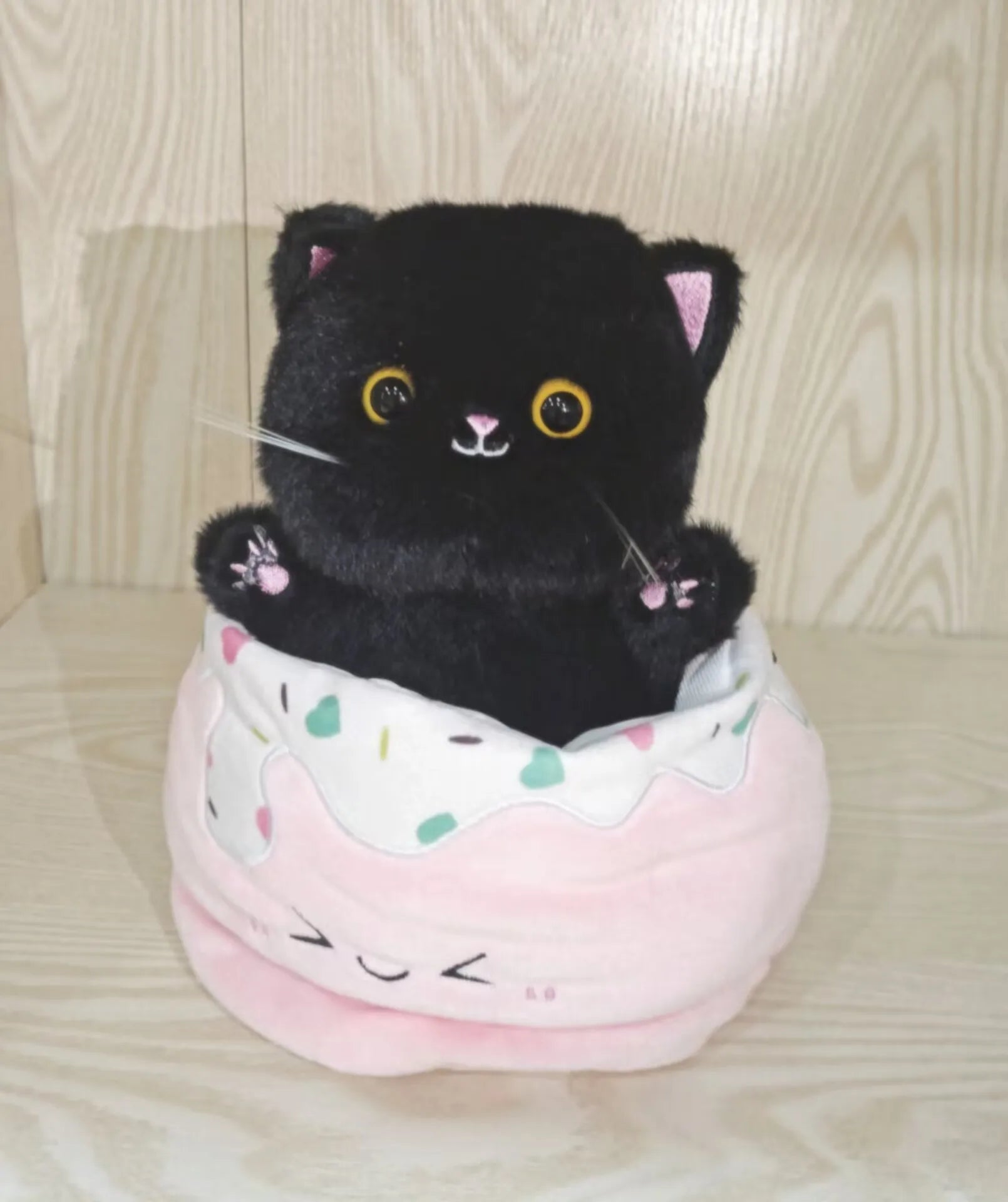 Adorable Plush Cat in Striped Cupcake Bed - Image 8