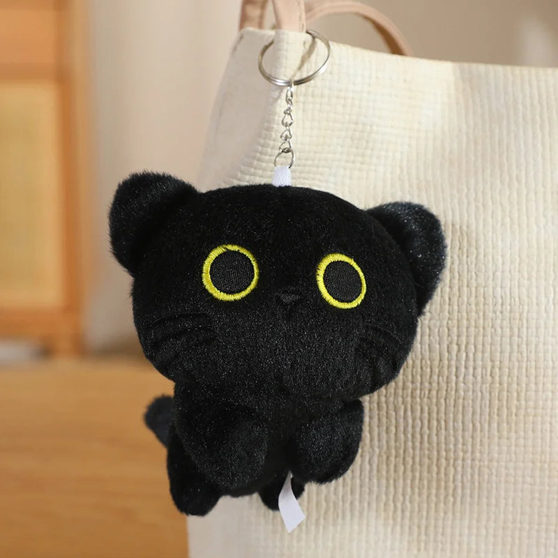 Adorable Black Cat Plush with Yellow Eyes - Image 3