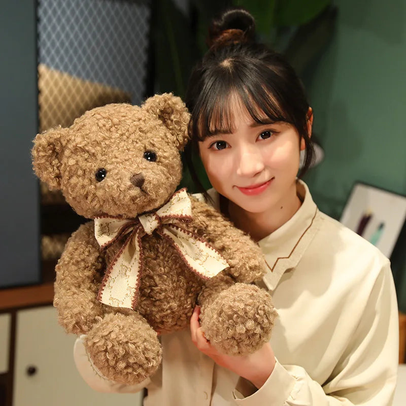 Fluffy Pink Teddy Bear with Patterned Bow - Image 2