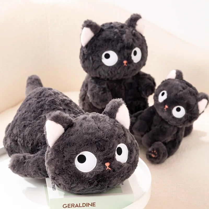 Dark Grey Plush Cat with Wide Eyes and Pink Paws - Image 2